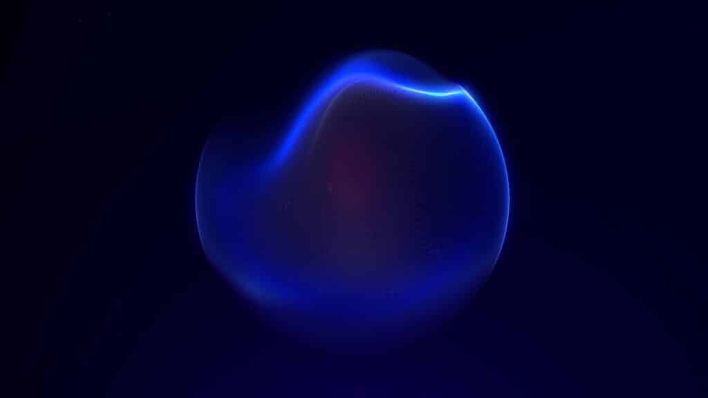 A glowing, abstract shape with smooth curves, predominantly colored in shades of blue, set against a dark background.